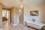 Feel yourself on Seven Heaven relaxing in a luxe clawfoot tub and walk-in shower 